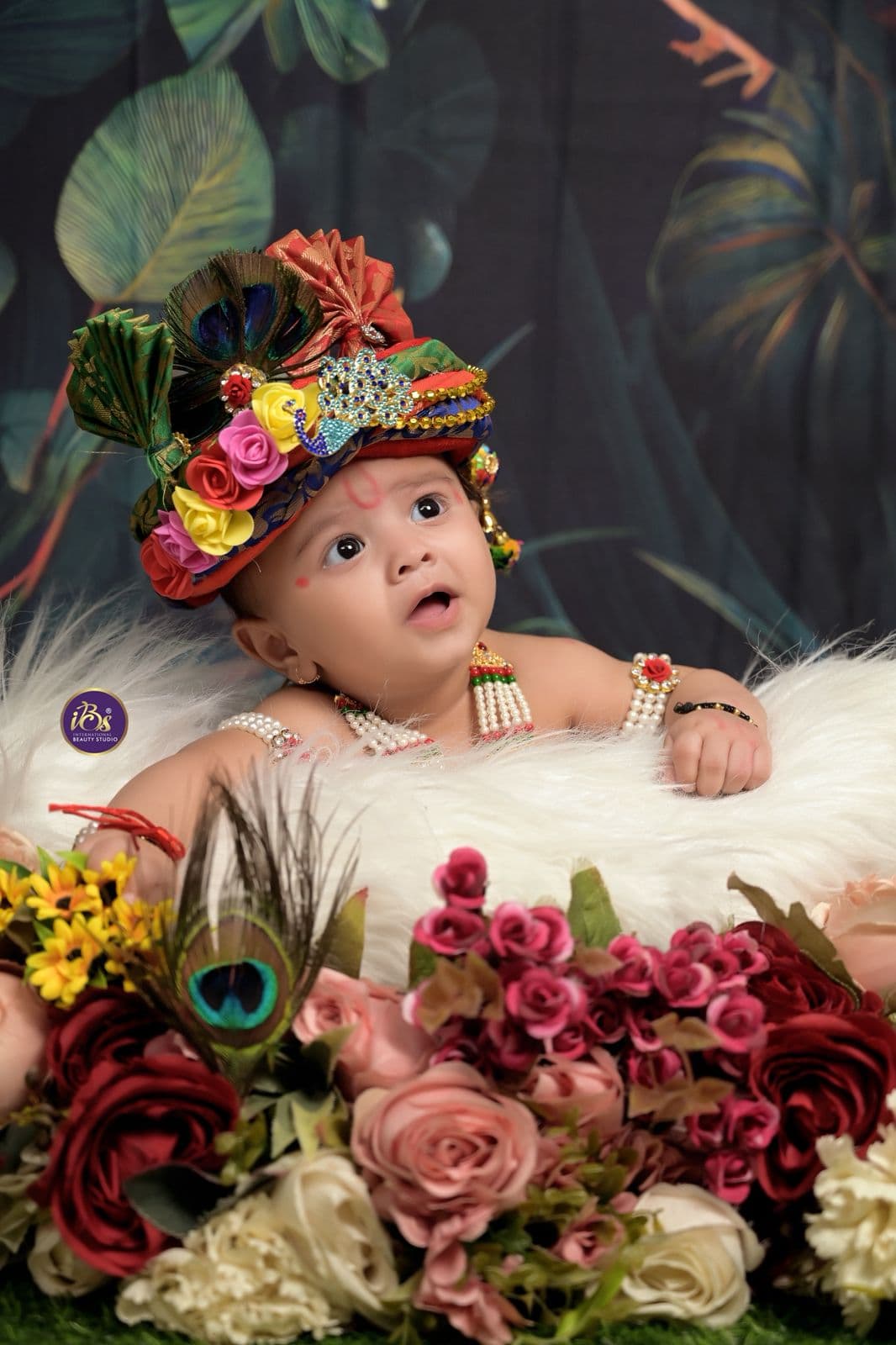Newborn baby portrait with soft wrap styling at IBS Baby Photoshoot studio in Karvenagar, Pune