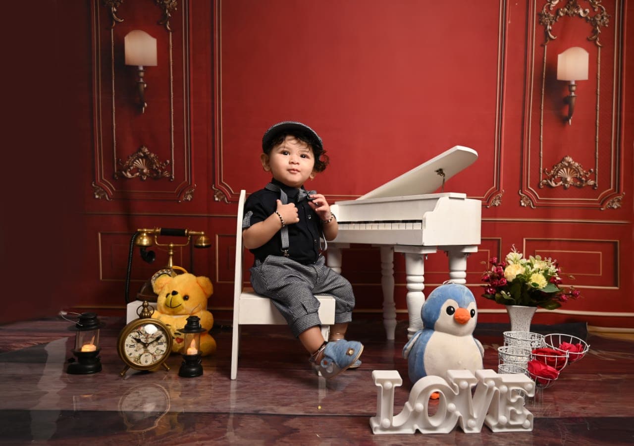 Professional baby photography theme with warm tones at IBS Baby Photoshoot studio in Karvenagar, Pune